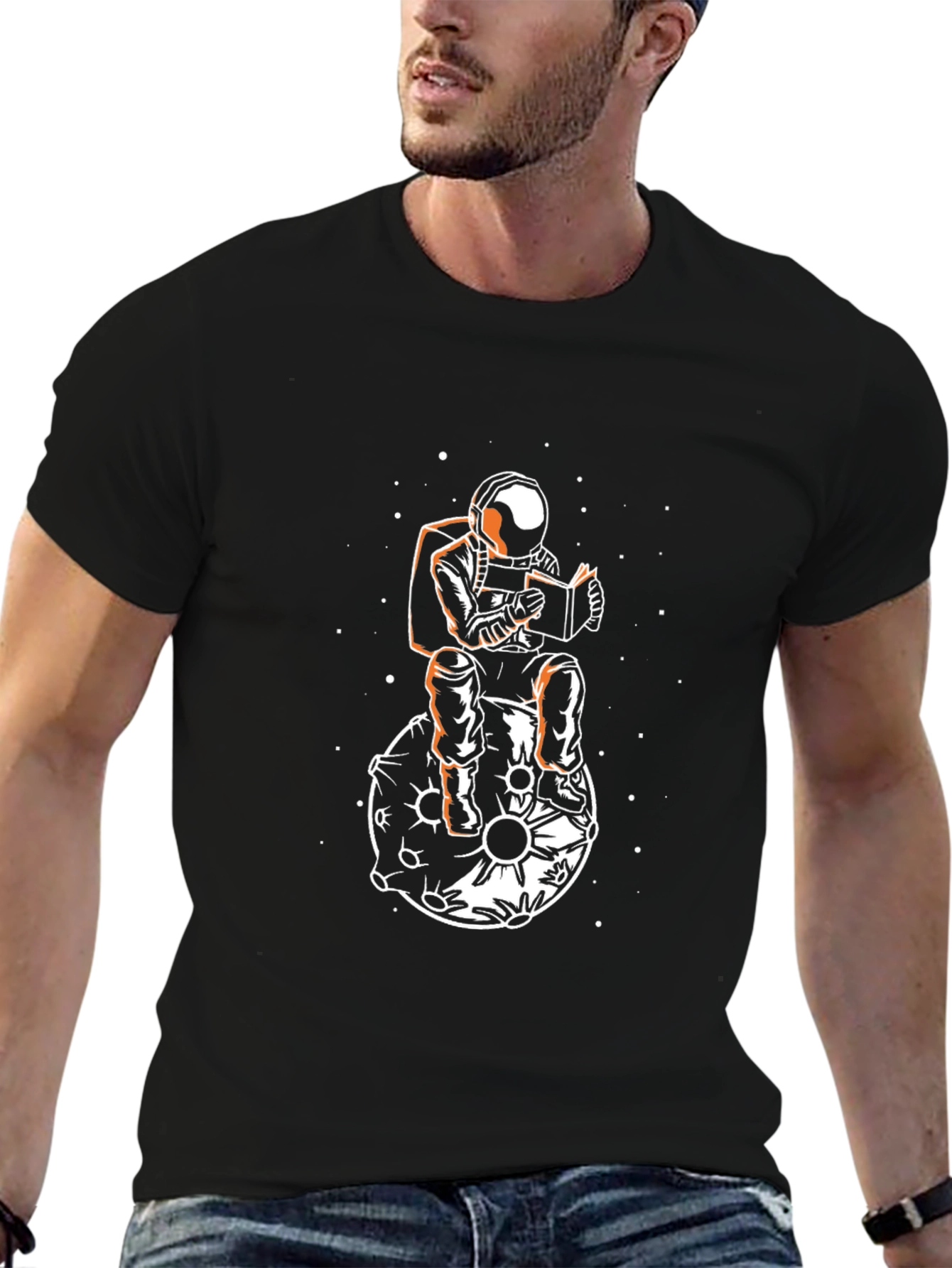 Astronaut Reading on Moon Graphic T-Shirt