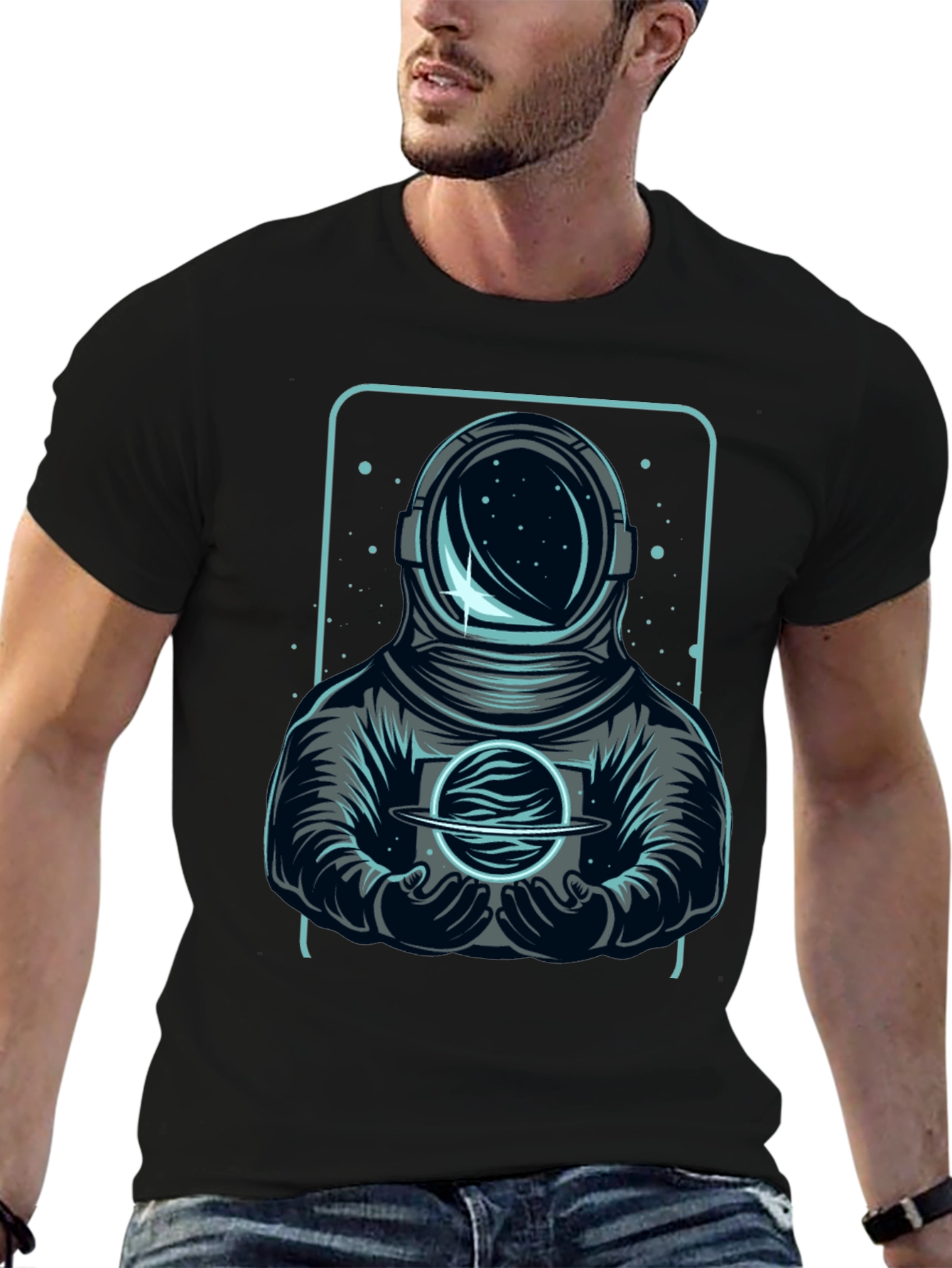 Astronaut Holding Planet Graphic Tee
