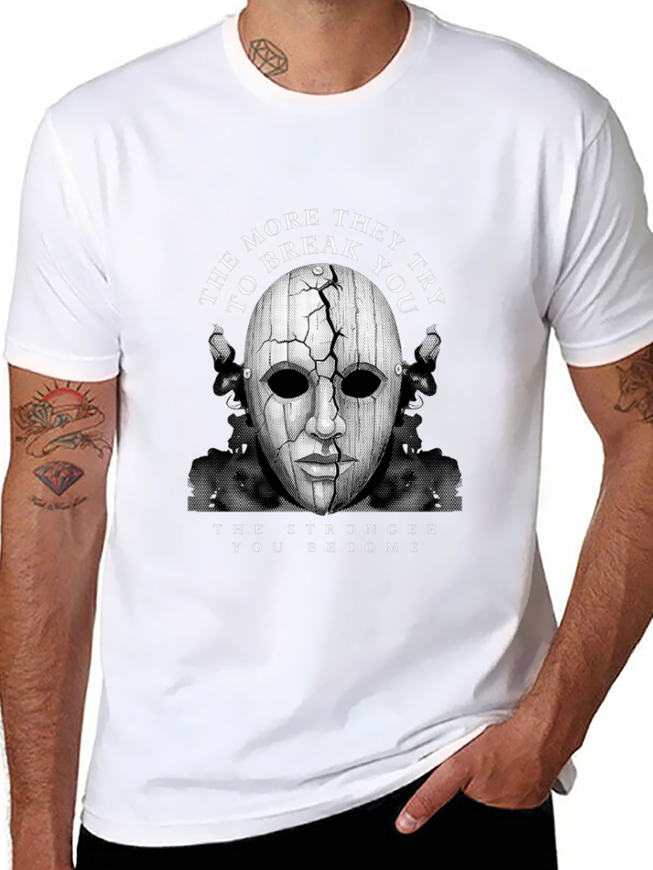 Cracked Mask Graphic T-Shirt - Strength Through Adversity